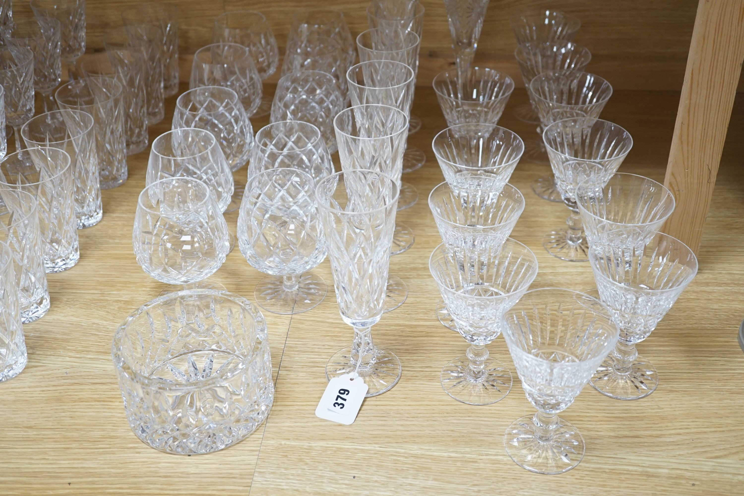 A large comprehensive suite of Waterford Tramore pattern cut crystal drinking glasses